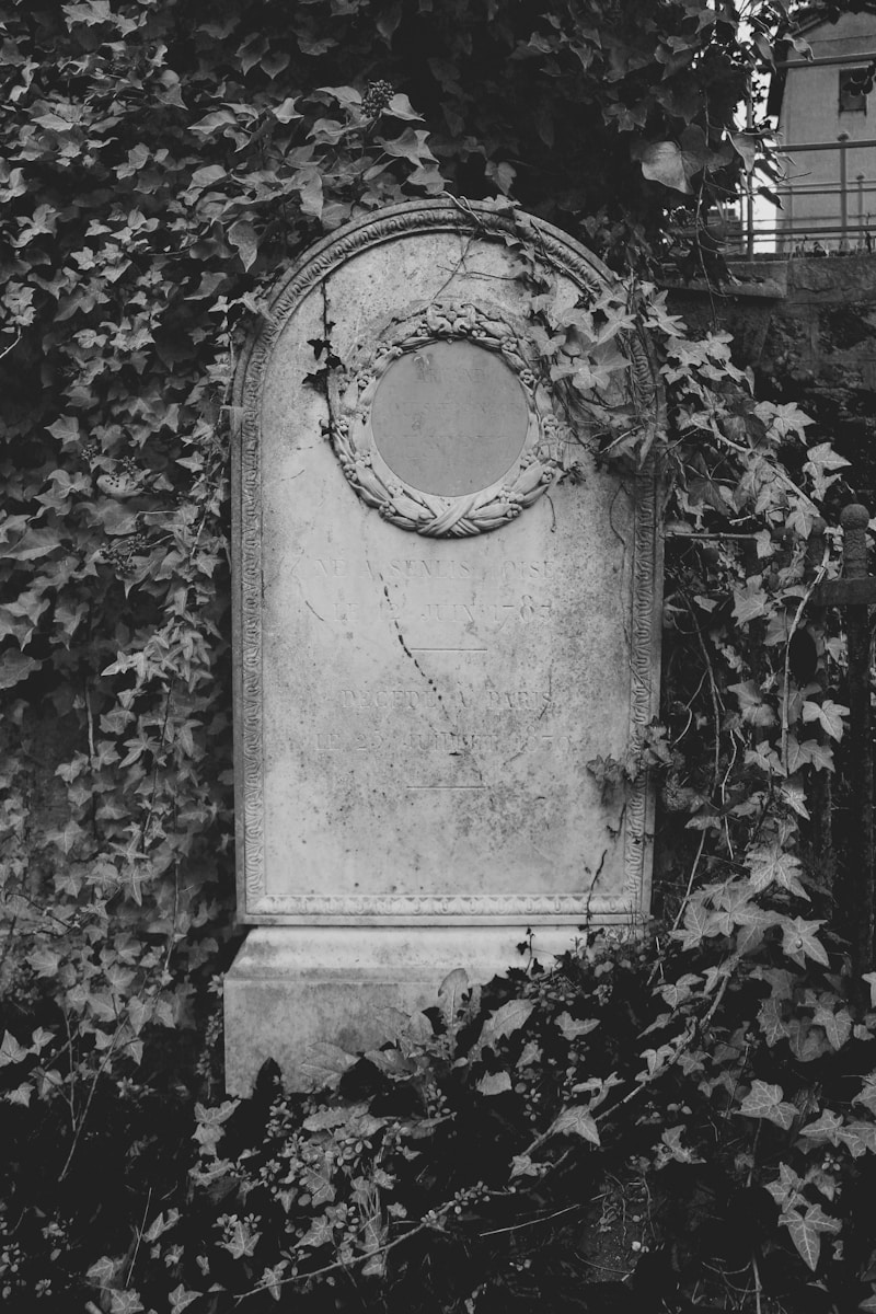 grayscale photo of concrete wall with hole